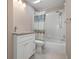 Clean bathroom with a shower/tub combo and white vanity at 905 Addington Ct # 203, Venice, FL 34293