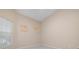 Spacious bedroom with window and wall decor at 905 Addington Ct # 203, Venice, FL 34293