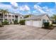 Condo building with attached garages and landscaping at 905 Addington Ct # 203, Venice, FL 34293