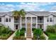 Two-story building with inviting landscaping at 905 Addington Ct # 203, Venice, FL 34293
