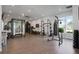 Spacious gym featuring modern exercise equipment and natural light at 905 Addington Ct # 203, Venice, FL 34293