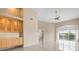 Bright living room with water views and tiled floors at 905 Addington Ct # 203, Venice, FL 34293
