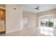 Bright living room with water views and tiled floors at 905 Addington Ct # 203, Venice, FL 34293
