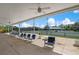 Relaxing patio area overlooking tennis courts at 905 Addington Ct # 203, Venice, FL 34293