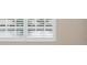 White window shutters at 905 Addington Ct # 203, Venice, FL 34293
