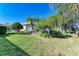 Landscaped backyard with lush greenery at 9750 53Rd E Dr, Bradenton, FL 34211