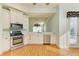 Modern kitchen with stainless steel appliances and ample counter space at 9750 53Rd E Dr, Bradenton, FL 34211