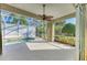 Relaxing screened-in pool area with plenty of space for lounging at 9750 53Rd E Dr, Bradenton, FL 34211