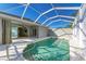 Refreshing screened pool with a spa at 9750 53Rd E Dr, Bradenton, FL 34211