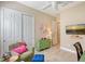 Charming bedroom with a sitting area and plenty of closet space at 1014 Overlook Ct, Bradenton, FL 34208