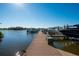 Private boat docks and walkways providing direct water access at 1014 Overlook Ct, Bradenton, FL 34208