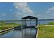 Convenient boat ramp with a covered structure for easy launching at 1014 Overlook Ct, Bradenton, FL 34208