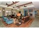 Clubhouse lounge with hardwood floors and comfortable seating at 1014 Overlook Ct, Bradenton, FL 34208