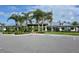 Community clubhouse with ample parking and lush landscaping at 1014 Overlook Ct, Bradenton, FL 34208