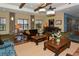 Relaxing community room with comfortable seating and a fireplace at 1014 Overlook Ct, Bradenton, FL 34208