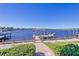 Private dock with covered seating area, perfect for enjoying waterfront views at 1014 Overlook Ct, Bradenton, FL 34208