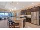 Spacious kitchen with granite countertops, stainless steel appliances, and an island at 1014 Overlook Ct, Bradenton, FL 34208