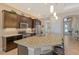 Modern kitchen with granite countertops and stainless steel appliances at 1014 Overlook Ct, Bradenton, FL 34208