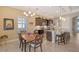 Modern kitchen with granite countertops and dark wood cabinets at 1014 Overlook Ct, Bradenton, FL 34208