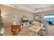 Relaxing living room with light-colored furniture and a view of the water at 1014 Overlook Ct, Bradenton, FL 34208