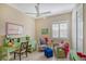 Home office with built-in shelving and seating area at 1014 Overlook Ct, Bradenton, FL 34208