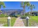 Brick walkway leading to a waterfront patio at 1014 Overlook Ct, Bradenton, FL 34208