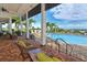Relaxing pool area with lounge chairs and covered seating at 1014 Overlook Ct, Bradenton, FL 34208