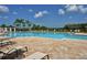 Large resort-style pool with plenty of lounge chairs at 1014 Overlook Ct, Bradenton, FL 34208