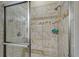 Walk-in shower with tile surround at 1014 Overlook Ct, Bradenton, FL 34208