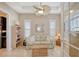 Relaxing sitting room with sofa and built-in shelving at 1014 Overlook Ct, Bradenton, FL 34208