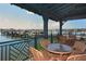 Covered patio overlooking the marina at 1014 Overlook Ct, Bradenton, FL 34208