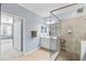 Modern bathroom with a glass shower and updated fixtures at 10817 Tarflower Dr # 202, Venice, FL 34293