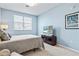 Comfortable bedroom with a flat-screen TV and relaxing atmosphere at 10817 Tarflower Dr # 202, Venice, FL 34293