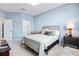 Light and airy bedroom with a cozy seating area at 10817 Tarflower Dr # 202, Venice, FL 34293
