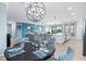 Elegant dining room with a round table and stylish chairs at 10817 Tarflower Dr # 202, Venice, FL 34293