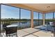 Screened lanai overlooking a peaceful lake and golf course at 10817 Tarflower Dr # 202, Venice, FL 34293