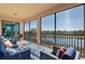 Enjoy the outdoors on this screened balcony with comfortable seating at 10817 Tarflower Dr # 202, Venice, FL 34293