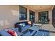 Spacious screened balcony with comfortable seating and lake views at 10817 Tarflower Dr # 202, Venice, FL 34293