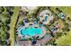 Community pool, playground, and volleyball court at 12689 Promenade Estates Blvd, Sarasota, FL 34238
