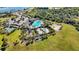 Community pool, playground, and sports court at 12689 Promenade Estates Blvd, Sarasota, FL 34238