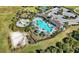 Community pool, playground, and ample parking at 12689 Promenade Estates Blvd, Sarasota, FL 34238