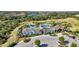 Community pool with adjacent playground and parking at 12689 Promenade Estates Blvd, Sarasota, FL 34238