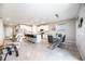 Open concept kitchen with white cabinets and island at 12689 Promenade Estates Blvd, Sarasota, FL 34238