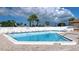 Refreshing community pool with ample deck space for lounging at 13368 Englewood Rd, Port Charlotte, FL 33981