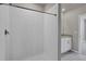 Clean bathroom with tiled shower and vanity with granite top at 148 Whiteland Bnd, Nokomis, FL 34275