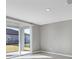 Room with sliding door and neutral-colored walls at 148 Whiteland Bnd, Nokomis, FL 34275