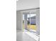 Interior view of sliding glass door leading to backyard at 148 Whiteland Bnd, Nokomis, FL 34275