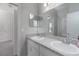 Double vanity bathroom with granite countertops and a large mirror at 16128 67Th E Ct, Parrish, FL 34219