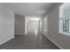 Simple dining room with gray walls and wood floors at 16128 67Th E Ct, Parrish, FL 34219