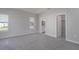 Large main bedroom with plush carpeting and ample closet space at 16128 67Th E Ct, Parrish, FL 34219